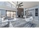 Bright living room with tile flooring, a cozy fireplace, and a sliding glass door at 1219 E Seminole Dr, Phoenix, AZ 85022