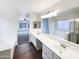 Well-lit bathroom with double sinks, vanity, and a view of the soaking tub at 1405 E Cathedral Rock Dr, Phoenix, AZ 85048