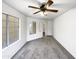 Comfortable bedroom with carpet, a ceiling fan, and natural light at 1405 E Cathedral Rock Dr, Phoenix, AZ 85048