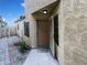 Exterior of a cozy home with a security screen door and a landscaped yard at 1405 E Cathedral Rock Dr, Phoenix, AZ 85048