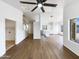 Bright and airy living room with hardwood floors, a ceiling fan, and an open floor plan at 1405 E Cathedral Rock Dr, Phoenix, AZ 85048