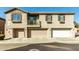 Inviting townhome with multiple garage spaces and balcony at 1458 N 80Th Ln, Phoenix, AZ 85043