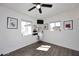 Bright bedroom featuring hardwood floors, two windows, and contemporary decor at 1515 E Sunnyslope Ln, Phoenix, AZ 85020