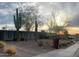 View of house at sunset featuring desert landscaping, including cactus and native plants at 1515 E Sunnyslope Ln, Phoenix, AZ 85020