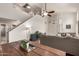 Light-filled living room featuring high ceilings, wood floors, and comfortable, modern furnishings at 16036 N 11Th Ave # 1126, Phoenix, AZ 85023