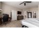 Spacious main bedroom features neutral paint and carpet, with an ensuite bath and walk-in closet at 16036 N 11Th Ave # 1126, Phoenix, AZ 85023