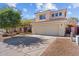 Charming two-story home with a well-maintained front yard and a two-car garage at 16618 S 28Th Pl, Phoenix, AZ 85048