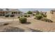 View of several desert homes with brick pathways, desert landscaping, covered patios and block fencing at 1793 E Desert Inn Dr, Chandler, AZ 85249