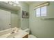 Bathroom featuring a vanity with sink, toilet, and walk-in shower at 1793 E Desert Inn Dr, Chandler, AZ 85249