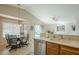 Open concept kitchen and dining room with tile flooring and lots of light at 1793 E Desert Inn Dr, Chandler, AZ 85249