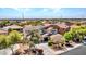 Stunning exterior view of this two-story home featuring a landscaped yard and solar panels at 18225 W Mackenzie Dr, Goodyear, AZ 85395