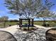 Scenic park picnic area with a stone shelter and lush green surroundings at 18225 W Mackenzie Dr, Goodyear, AZ 85395