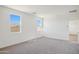 Carpeted bedroom with ample natural light through windows offering views of the outdoors at 18848 E Bruno Dr, Gold Canyon, AZ 85118