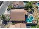 This aerial view of the property showcases the pool, outdoor lounge area, and more at 1896 S Porter St, Gilbert, AZ 85295