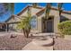 Charming single-story home with a two-car garage, desert landscaping, and tile roof at 1896 S Porter St, Gilbert, AZ 85295