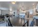 Open concept dining room and kitchen, with the living room in the background at 1896 S Porter St, Gilbert, AZ 85295