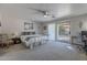 Serene bedroom with a ceiling fan and sliding glass door to the backyard at 1896 S Porter St, Gilbert, AZ 85295