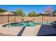 Relaxing backyard pool featuring clear water, surrounding concrete, and a calming outdoor space at 1896 S Porter St, Gilbert, AZ 85295