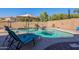 Inviting backyard pool features lounge chairs and plenty of space for relaxation and outdoor enjoyment at 1896 S Porter St, Gilbert, AZ 85295