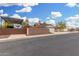 View of backyard featuring a trailer, utility shed and block wall at 1938 N 67Th St, Mesa, AZ 85205