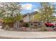 Inviting two-story home with desert landscaping, circular drive and charming exterior at 1938 N 67Th St, Mesa, AZ 85205