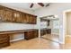 Spacious bedroom with built in wall cabinets and drawers and mirrored closet doors at 19927 N 108Th Ln, Sun City, AZ 85373