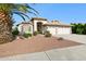 Beautiful single-story home featuring desert landscaping and a three-car garage at 19927 N 108Th Ln, Sun City, AZ 85373