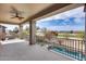 Spacious balcony with golf course and pool views, perfect for enjoying outdoor living and relaxation at 22050 N Balboa Dr, Maricopa, AZ 85138