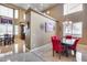 Dining room showcasing a high ceiling, chandelier and seating for eight at 22050 N Balboa Dr, Maricopa, AZ 85138