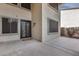 Front entrance features a decorative black iron door with surrounding windows at 22050 N Balboa Dr, Maricopa, AZ 85138