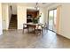 Dining room area showcasing access to the backyard and nearby kitchen at 2344 W Barwick Dr, Phoenix, AZ 85085