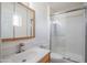 Bathroom featuring a vanity with a mirror, a toilet, and a walk-in shower with sliding glass doors at 2507 E Golden St, Mesa, AZ 85213