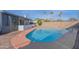 Inviting backyard pool with an outdoor shower and a surrounding patio for relaxation and enjoyment at 2507 E Golden St, Mesa, AZ 85213