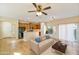 Inviting living room connected to a modern kitchen featuring tile floors, and lots of natural light at 2722 E Wesson Dr, Chandler, AZ 85286