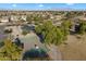 Aerial view of a basketball court surrounded by mature trees and residential houses at 2726 S Keene --, Mesa, AZ 85209