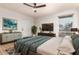 Comfortable bedroom with a modern decor, plenty of natural light, and hardwood floors at 2920 S Bala Dr, Tempe, AZ 85282