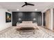 Modern main bedroom featuring a decorative wall, a ceiling fan and a stylish rug at 2920 S Bala Dr, Tempe, AZ 85282