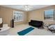 Bright bedroom featuring a large window with shutters and neutral colors perfect for play or relaxation at 3017 S Mesita --, Mesa, AZ 85212