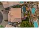 Bird's-eye view showcases the home's private backyard oasis with mature trees and sparkling pool at 3482 W Shannon St, Chandler, AZ 85226