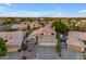 Scenic aerial view captures a lovely home in a neighborhood with mature landscaping and tidy streets at 3482 W Shannon St, Chandler, AZ 85226