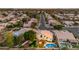 Aerial shot showcasing the property's pool, mature landscaping, and peaceful neighborhood setting at 3482 W Shannon St, Chandler, AZ 85226