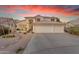 Charming two-story home featuring a three-car garage, and a meticulously xeriscaped front yard at 3482 W Shannon St, Chandler, AZ 85226