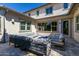 Comfortable outdoor seating area with a modern fire pit for relaxed gatherings at 3623 E Arabian Dr, Gilbert, AZ 85296