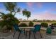 Relaxing backyard view with a seating area and a serene desert landscape at 3711 N 162Nd Ln, Goodyear, AZ 85395