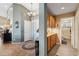 Entryway featuring a hall closet and partial view of the bathroom at 3711 N 162Nd Ln, Goodyear, AZ 85395