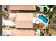 Aerial view of homes with private pools, patios, and well-manicured landscaping at 38572 N Jessica Ln, San Tan Valley, AZ 85140