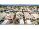 Expansive aerial view showcasing beautiful single-Gathering homes and their well-maintained yards in a desirable suburban neighborhood at 38572 N Jessica Ln, San Tan Valley, AZ 85140