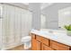 Well-lit bathroom with neutral colors, a single sink vanity, and a shower-tub combination at 38572 N Jessica Ln, San Tan Valley, AZ 85140