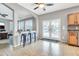 Cozy breakfast nook with tile flooring, access to outdoor pool, and seamless flow to the kitchen at 38572 N Jessica Ln, San Tan Valley, AZ 85140