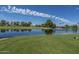 Scenic view of the pond with a fountain on the golf course at 422 S 76Th Way, Mesa, AZ 85208